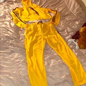 Matching black and yellow track suit!